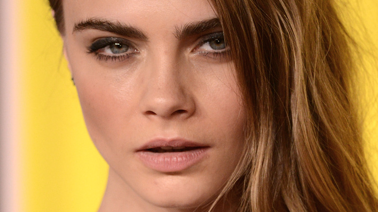 Cara Delevingne pouting smoky eyeshadow