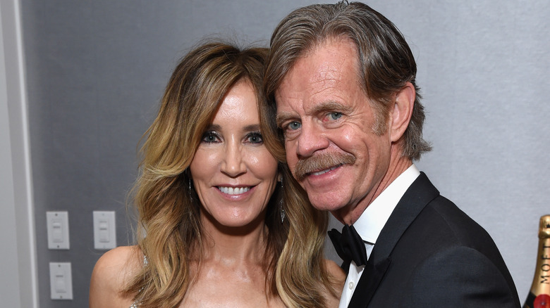 Felicity Huffman and William H Macy pose 