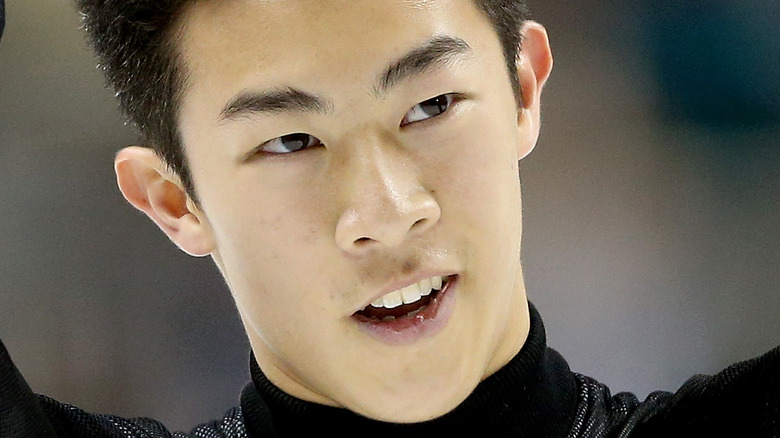 Nathan Chen smiles on ice