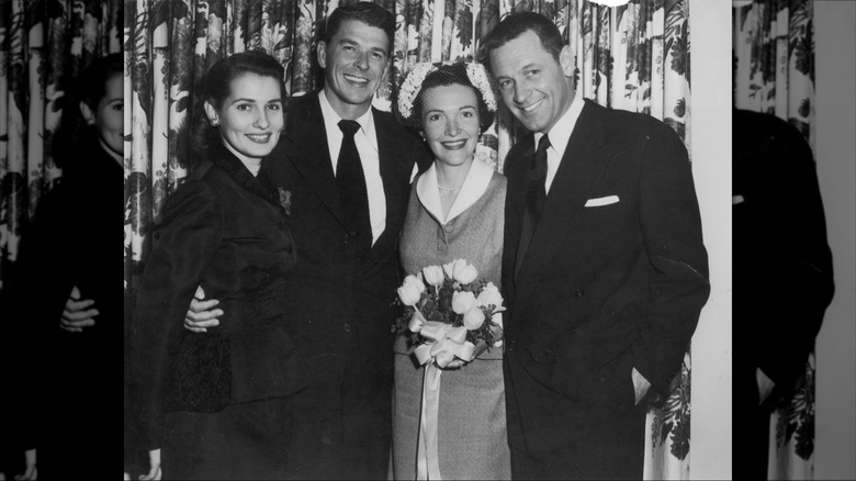 Ronald and Nancy Reagan pose with friends on their wedding day.
