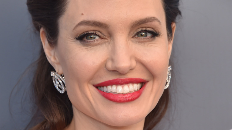 Angelina Jolie smiles on red carpet