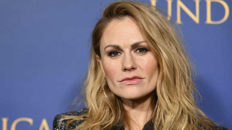 Up-close photo of Anna Paquin with a deep side-part.