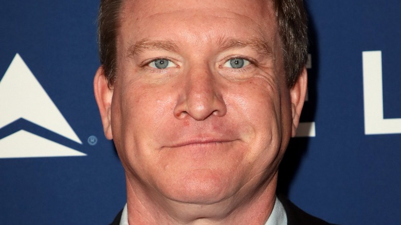 A closeup of Stoney Westmoreland against blue background