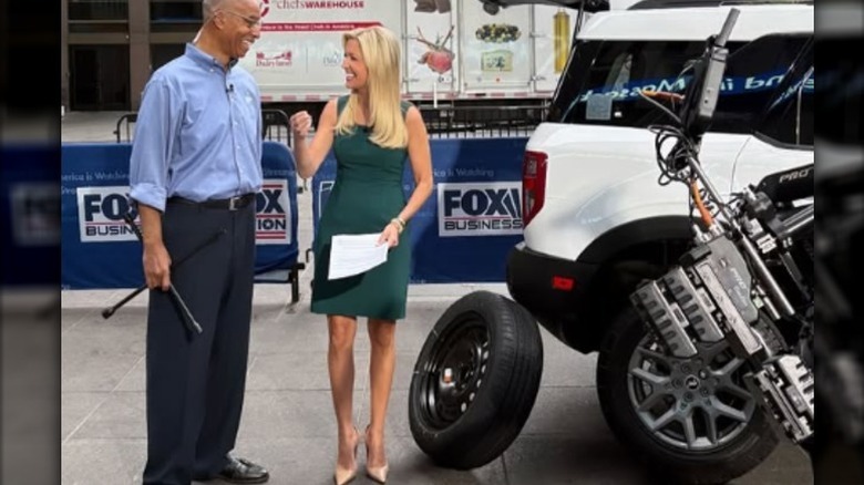 Ainsley Earhardt in a green minidress