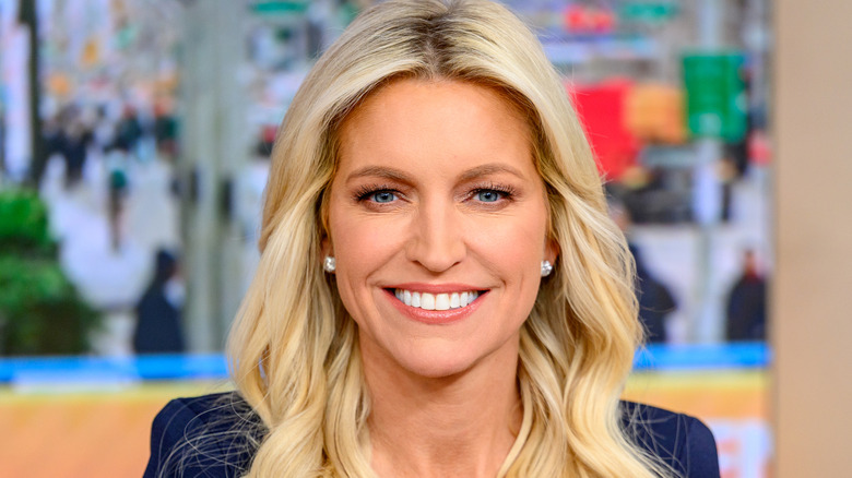Ainsley Earhardt smiling during a filming of Fox & Friends