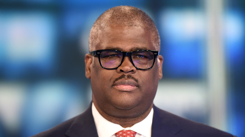Charles Payne wearing glasses