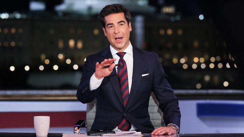 Jesse Watters at his desk