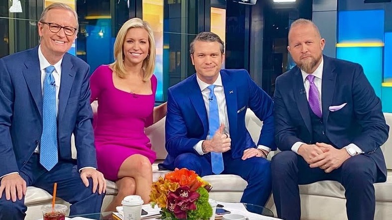 Ainsley Earhardt in a purple dress