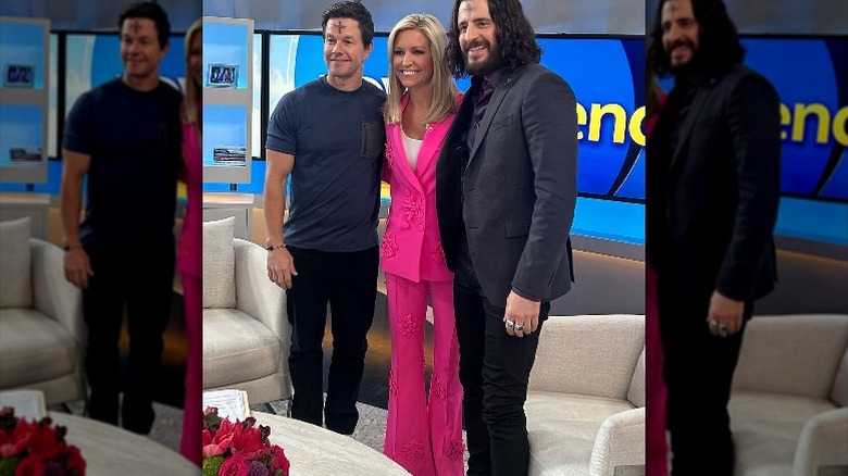 Mark Wahlberg, Ainsley Earhardt, and Jonathan Roumie on the set of "Fox and Friends" (2024)
