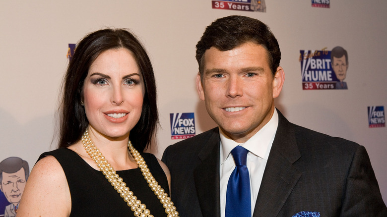 Bret Baier posing with wife Amy
