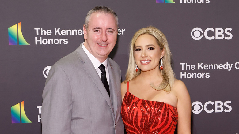Rep. Brian Fitzpatrick and Jacqui Heinrich posing for photos at the 2024 Kennedy Center Honors