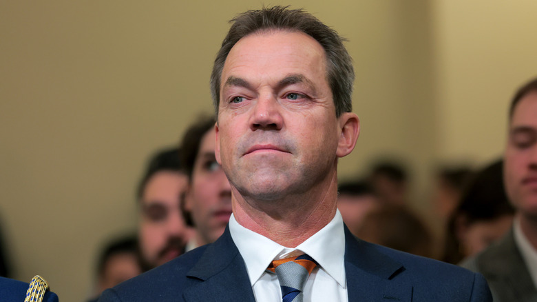Bryon Noem wearing a black suit while listening during Kristi Noem's hearing