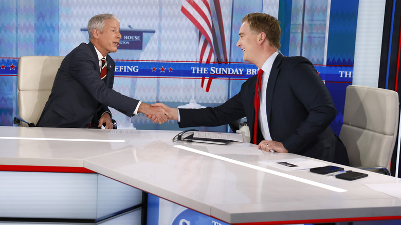 Peter Doocy shaking hands