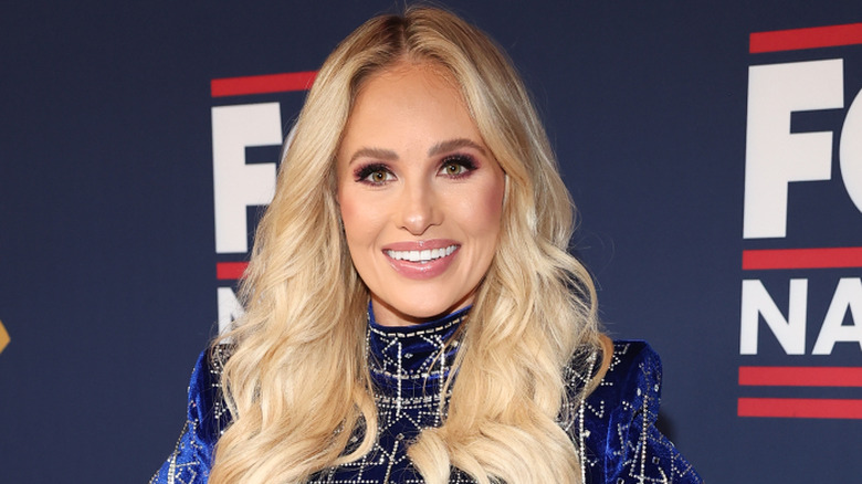 Tomi Lahren posing on the red carpet.