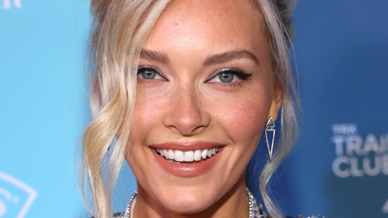 Camille Kostek smiling
