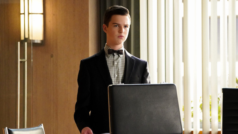 Iain Armitage with briefcase in scene from Young Sheldon