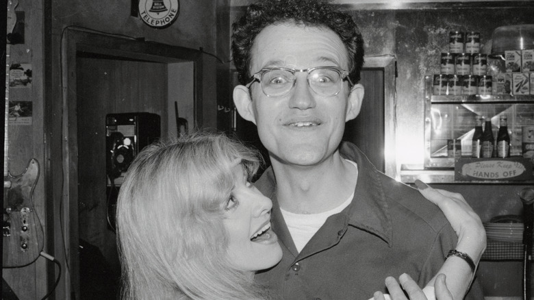 Stella Parton and Mark Hardwick posing for cameras