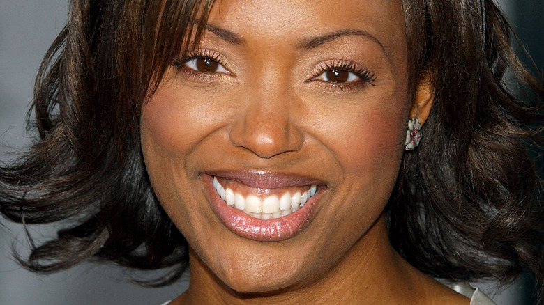 Aisha Tyler smiling wide 