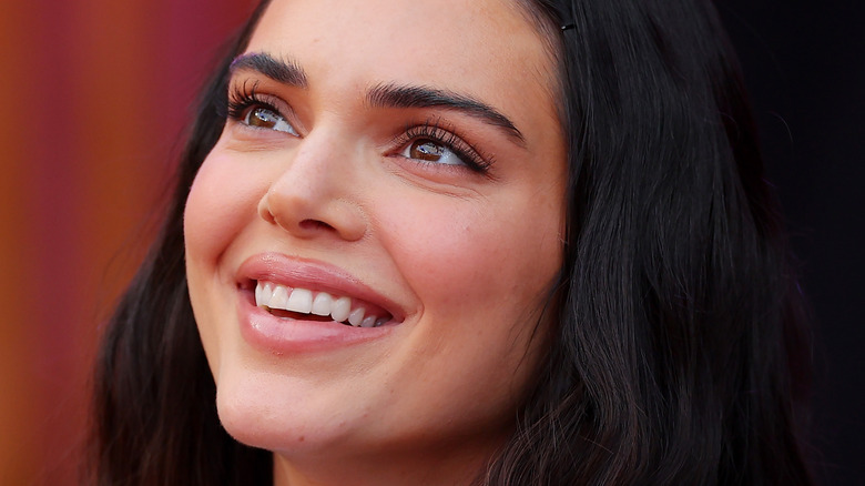 Kendall Jenner smiling with her teeth