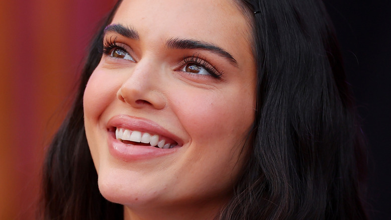 Kendall Jenner smiling with her teeth