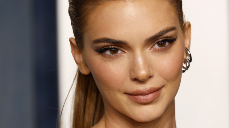 Kendall Jenner in a ponytail, smiling