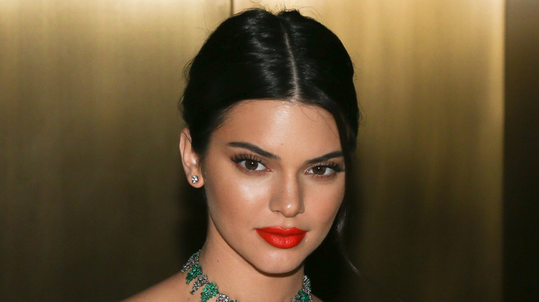 Kendall Jenner wearing an off the shoulder dress