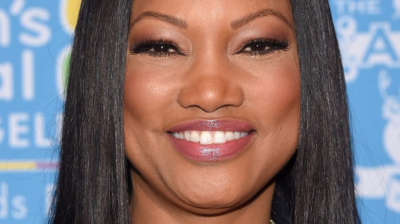 Garcelle Beauvais smiles