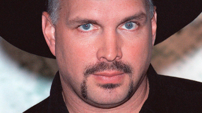 Garth Brooks and Trisha Yearwood smiling  