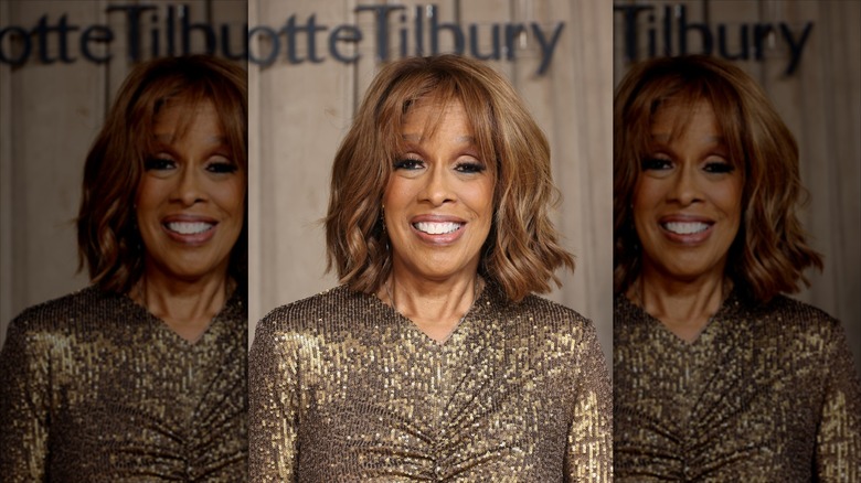 Gayle King smiling with teeth