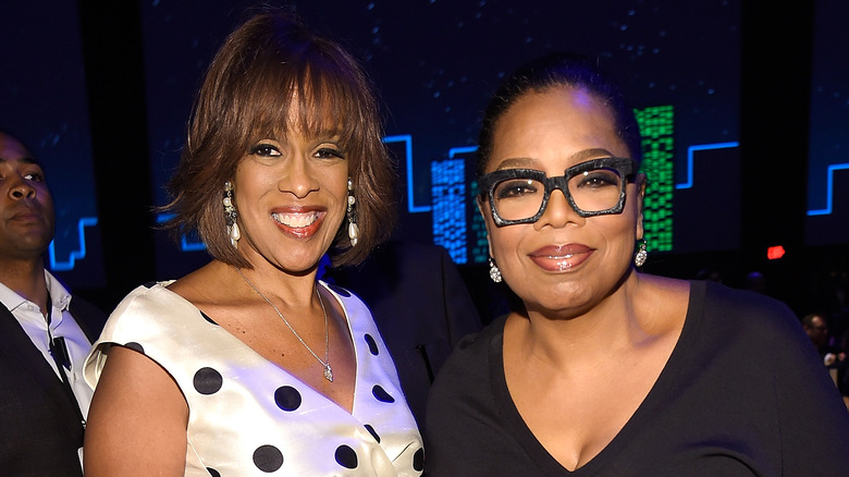 Gayle King and Oprah smile 