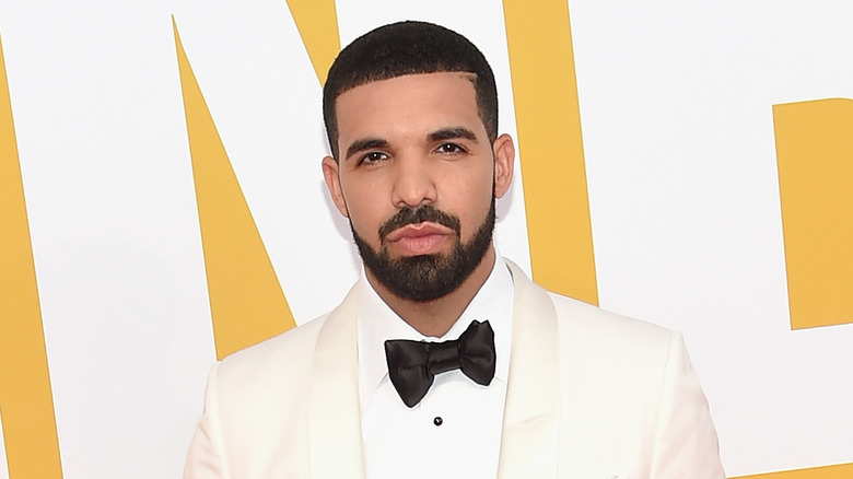 Drake with a serious expression