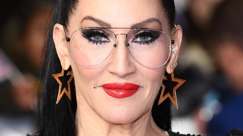 closeup of Michelle Visage star earrings