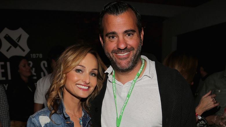 Giada De Laurentiis and Shane Farley posing together at an event.