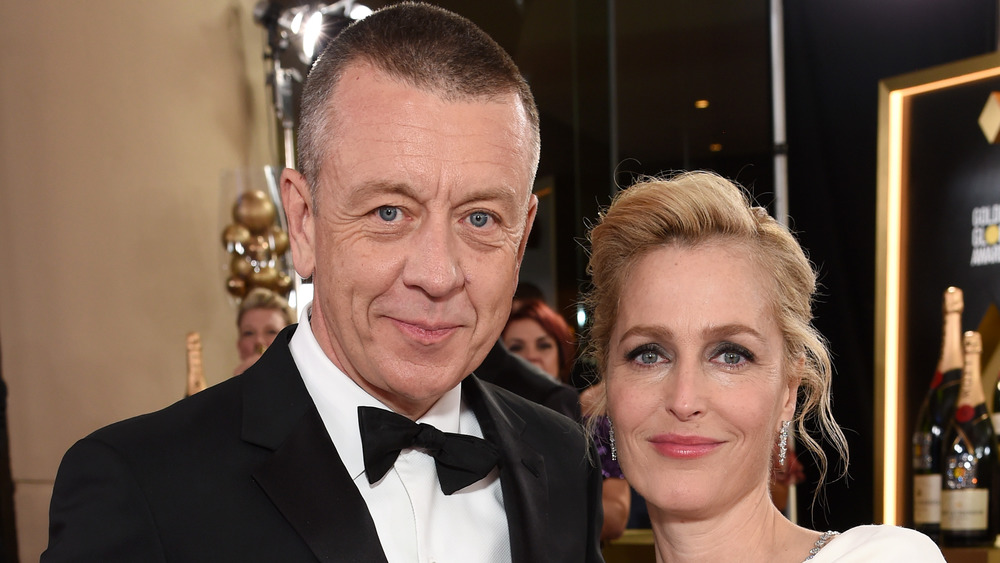 Peter Morgan and Gillian Anderson smiling