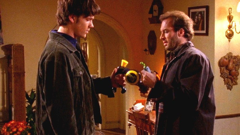 Dean (Jared Padalecki) and Luke (Scott Patterson) battle over Bop-It in "We Got Us a Pippi Virgin"