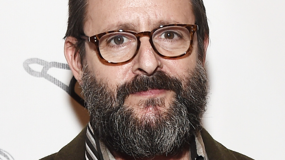 Judd Nelson beard and glasses close up