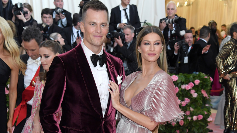 Tom Brady and Gisele Bündchen pose for photographers