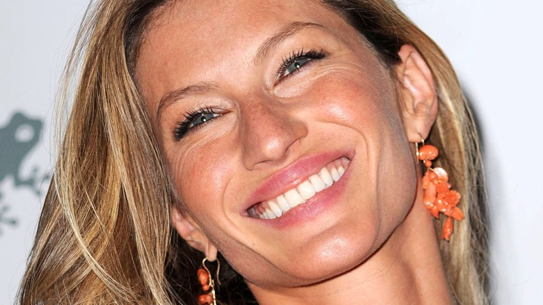 Gisele Bundchen orange earrings