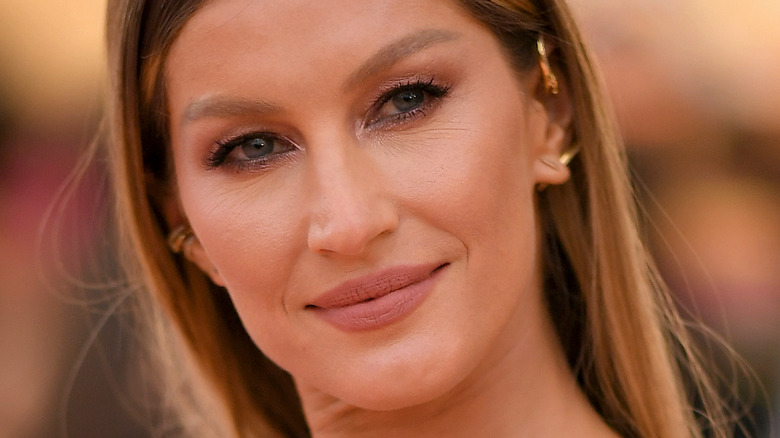 Gisele Bundchen smirk red carpet