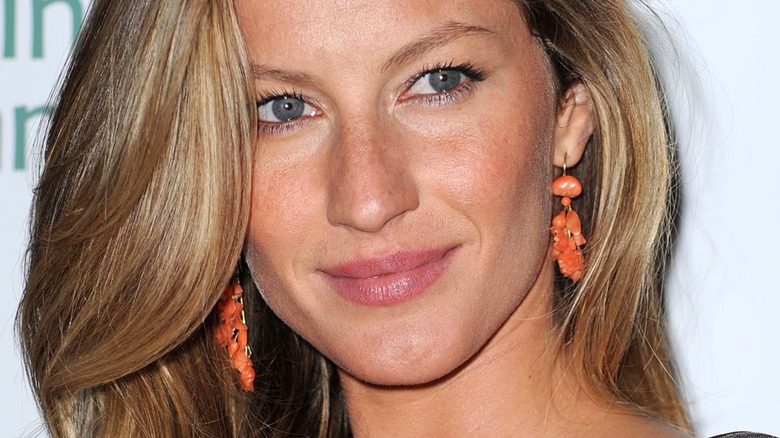 Gisele Bundchen orange earrings