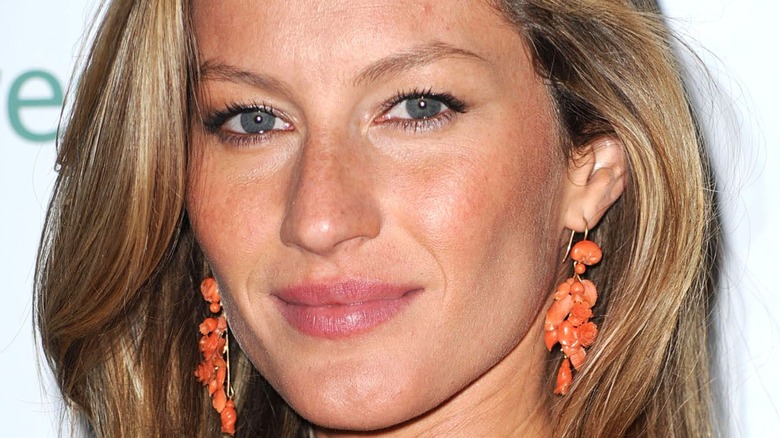 Gisele Bundchen orange earrings