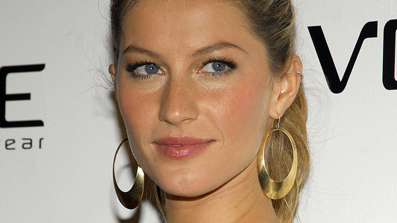 Gisele Bündchen large gold hoop earrings