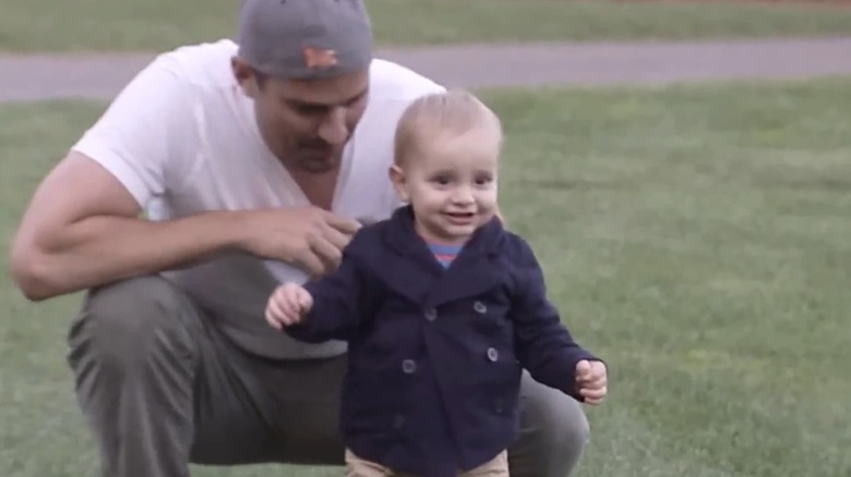 Little Duke Rancic takes his first steps as his father Bill Rancic watches