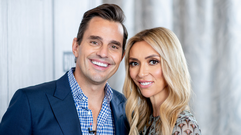 Bill and Giuliana Rancic posing together in 2018.