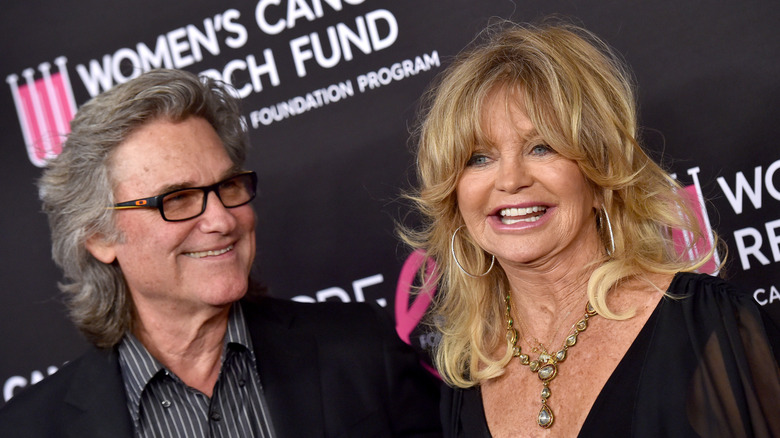 Goldie Hawn and Kurt Russell pose in 2019