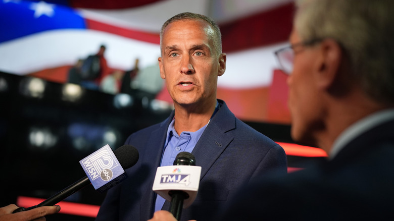 Political consultant Corey Lewandowski being interviewed by media at the Fiserv Forum