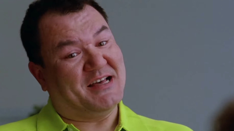 Patrick Gallagher as Coach Ken Tanaka on Glee