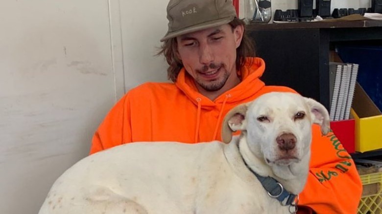 Parker Schnabel posing with dog