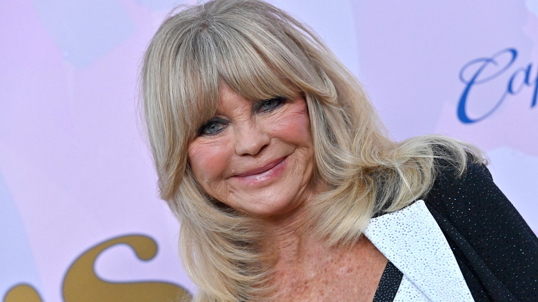 Goldie Hawn smiling while posing