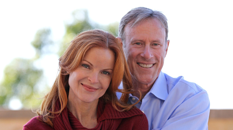 Marcia Cross and Tom Mahoney smiling in 2010